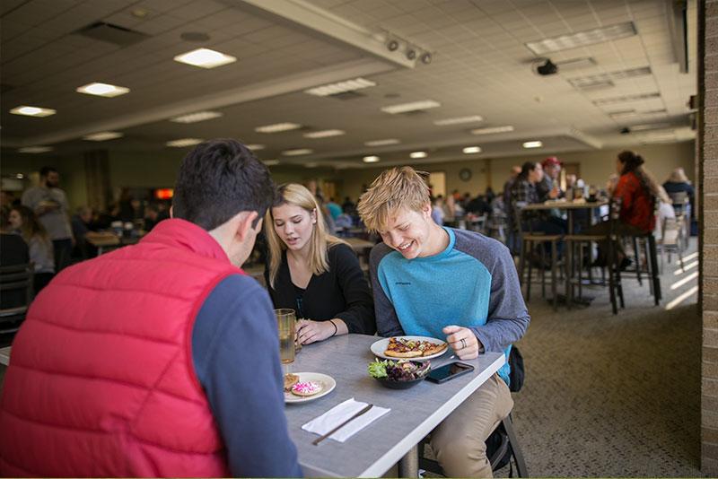 Students enjoying the atmosphere of Alex's